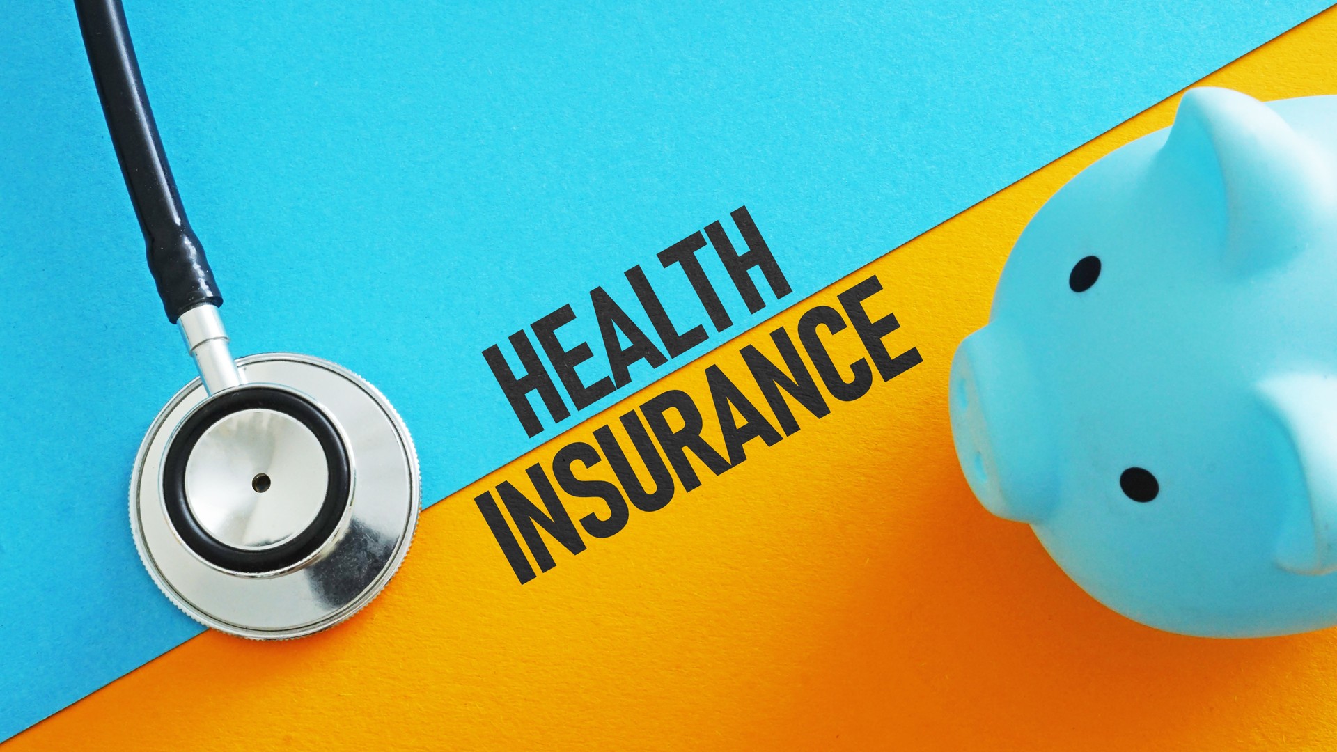 A stethoscope and a piggy bank as a symbol of health insurance.